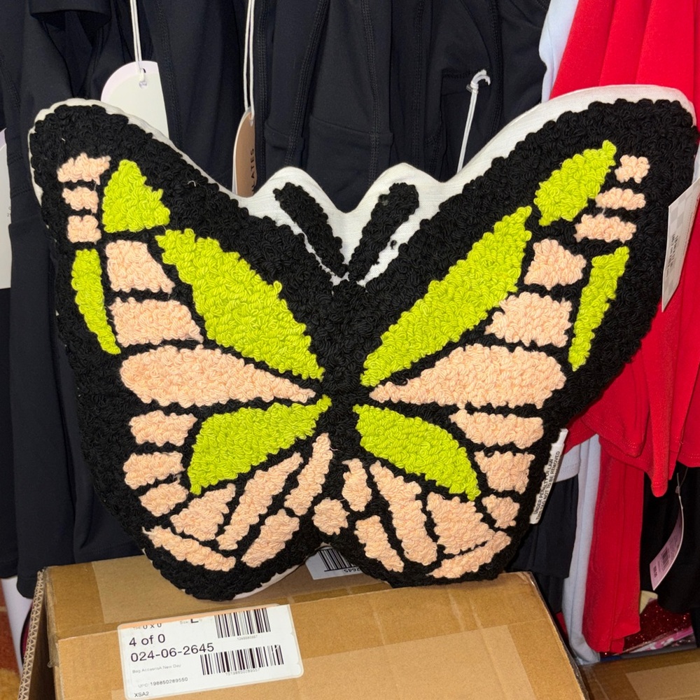 Butterfly Shaped Pillow with Black and Green Design